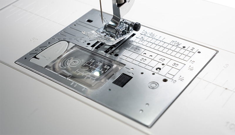 Janome Skyline S6 Advanced needle plate markings